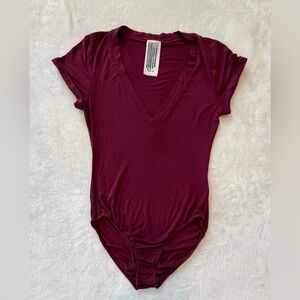 Free People V Neck Bodysuit Tee Women XSmall Burgundy Stretch Snap Closure